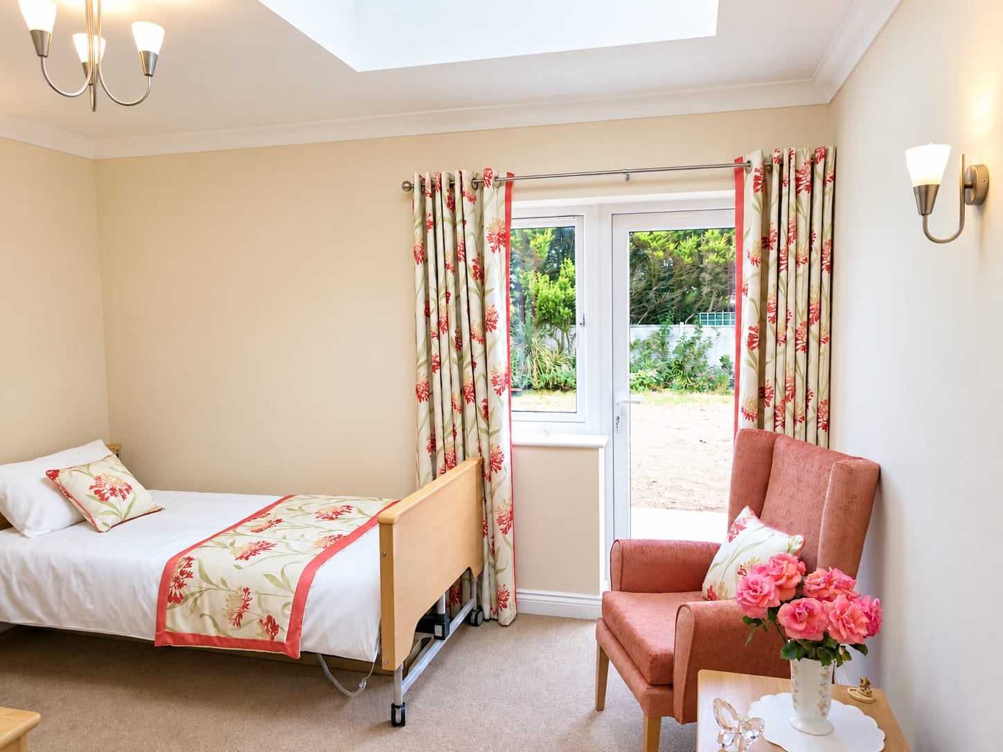 A single bedroom with an armchair and patio doors to the garden.